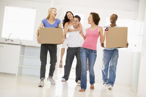 Moving van and worker preparing a UK man and van service booking