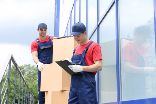 Professional movers handling a flat removal with careful access in Richmond upon Thames