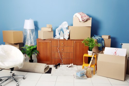 Removal van and moving team in a Richmond upon Thames residential street
