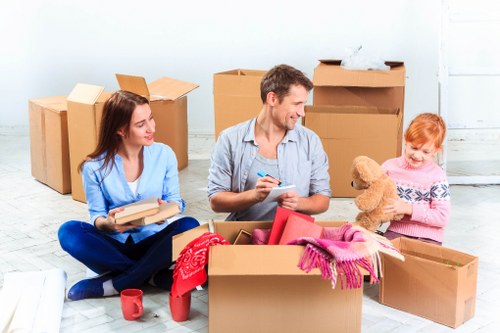 Local team handling furniture during a house move
