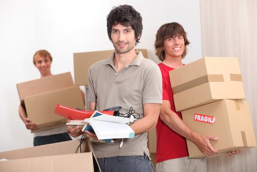 Packed office furniture ready for removals