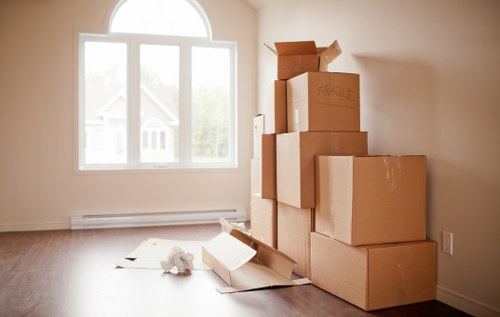 Staff handling household items during a local van move