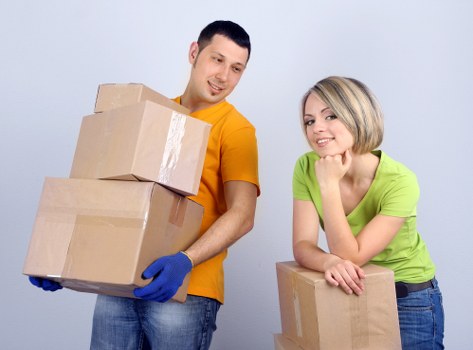Professional moving team loading boxes and furniture for a local Richmond upon Thames move
