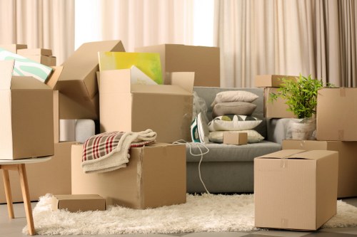 Packed moving boxes and furniture for a house removal