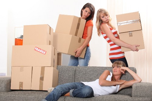 Organised moving boxes labeled for a house move in Richmond